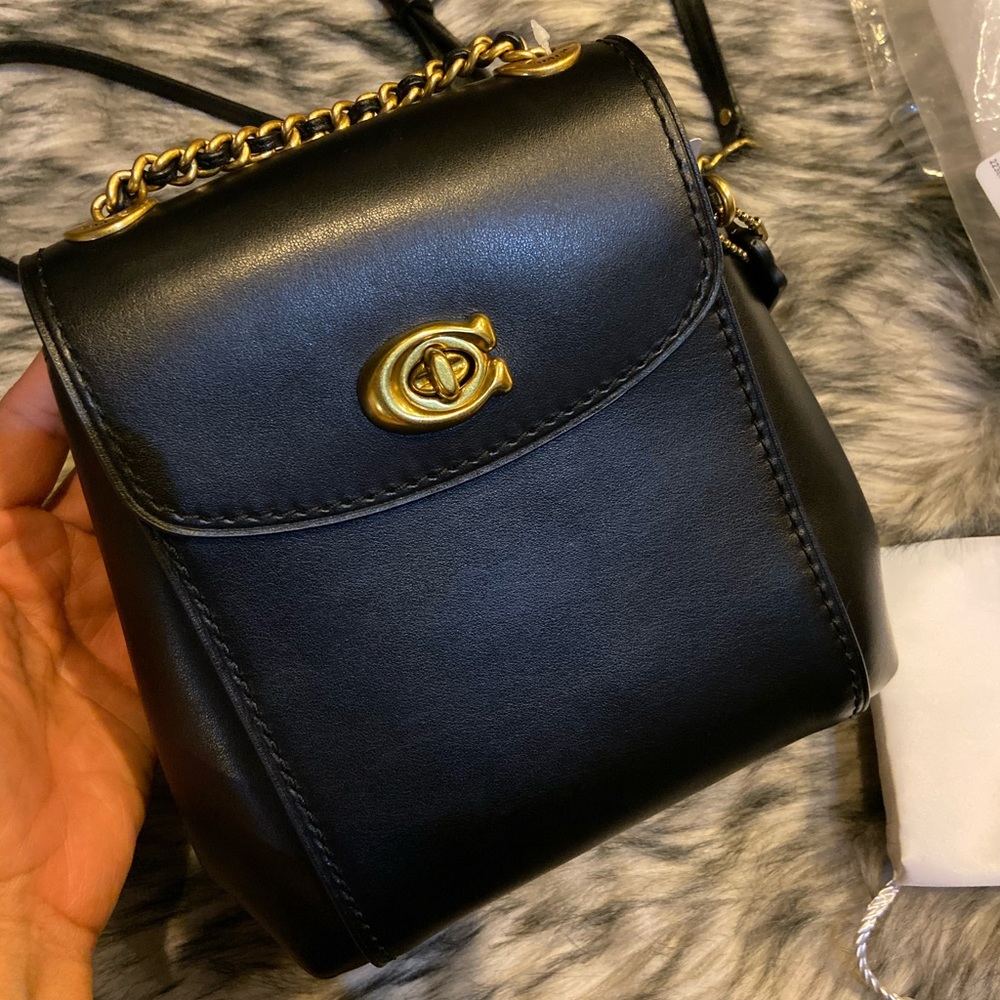 SOLD! Coach Parker 16